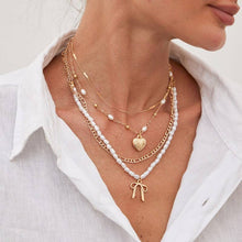 Load image into Gallery viewer, BEAUTIFUL BOW PEARL HEART PENDANT LAYERED NECKLACE