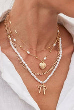 Load image into Gallery viewer, BEAUTIFUL BOW PEARL HEART PENDANT LAYERED NECKLACE